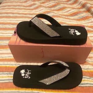 Brand new in the box JellyPop black sandals with rhinestones.